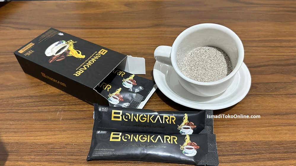 Tampilan kemasan asli box Kopi Bongkar isi 5 sachet beserta cangkir berisi serbuk kopi herbal yang siap diseduh untuk vitalitas pria dewasa - dalam artikel kopi bongkar bandung jabar antapani